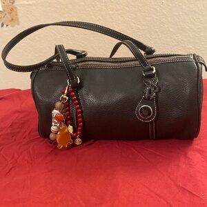 Dooney and Bourke Vtg chocolate leather barrel bag with charms